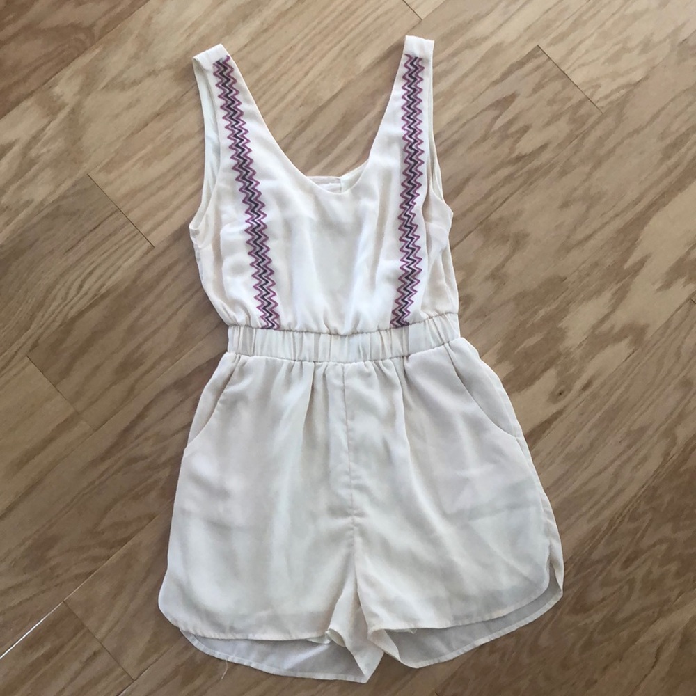 Cream romper with pockets